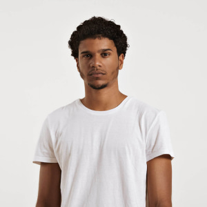 Fit and sexy young black man with an afro wearing a clean unlabeled white t-shirt 